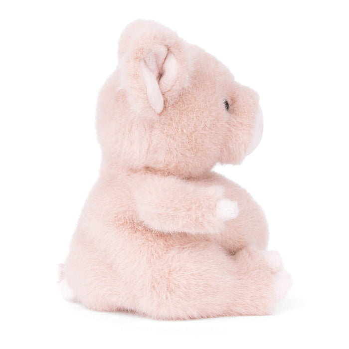 Light pink plush pig with folded arms and long ear detail