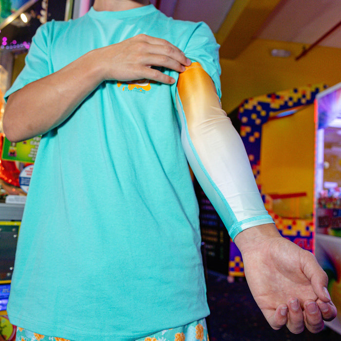 Adult model wearing Cotton Candy Tangerine Freeze arm sleeve