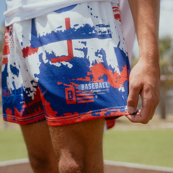 Adult model wearing multi-color Graffiti USA shorts