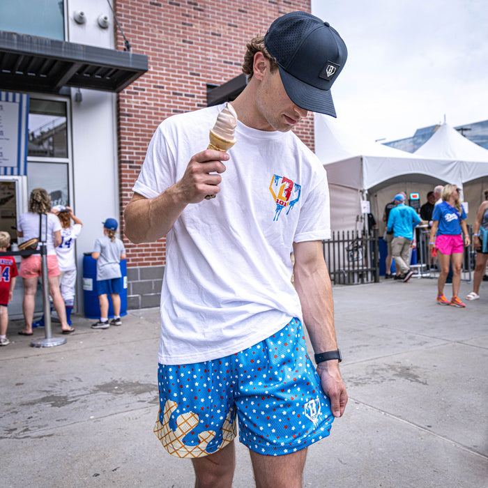 Adult model wearing blue Ice Cream USA shorts