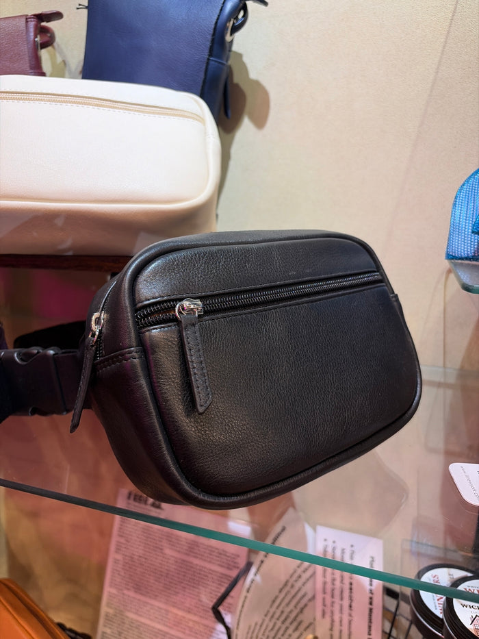 Leather zip belt bag by ili New York featuring a compact design and adjustable strap, perfect for hands-free carrying.