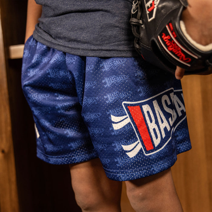 Youth model wearing red Pennant USA youth shorts