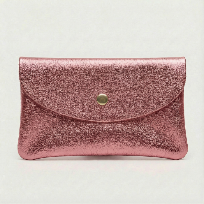Metallic pink leather wallet clutch with curved flap and small round snap closure