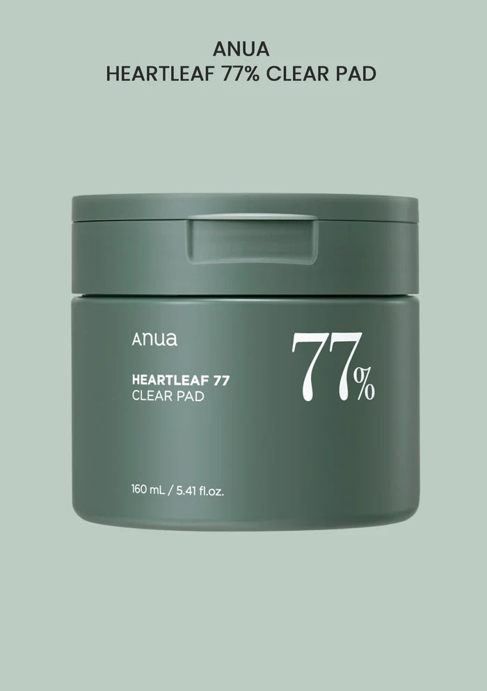 A product image showing the packaging of ANUA Heartleaf 77% Clear Pad which is a jar with a green lid and labeled with the product name and percentage of Heartleaf extract.