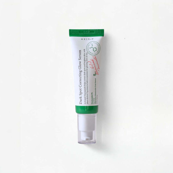 AXIS-Y Dark Spot Correcting Glow Serum 50ml in a white background packaging with green accents.