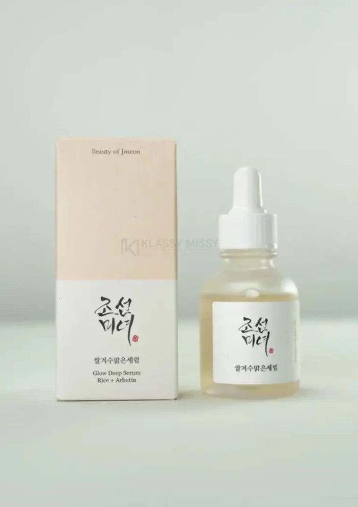 Korean skincare serum bottle and packaging on a light gray background