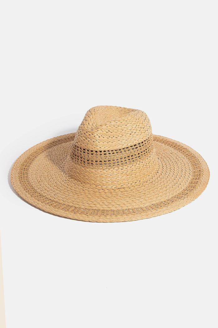Boho flat brim straw hat from Collections by Fame Accessories featuring a wide brim and stylish bohemian design.