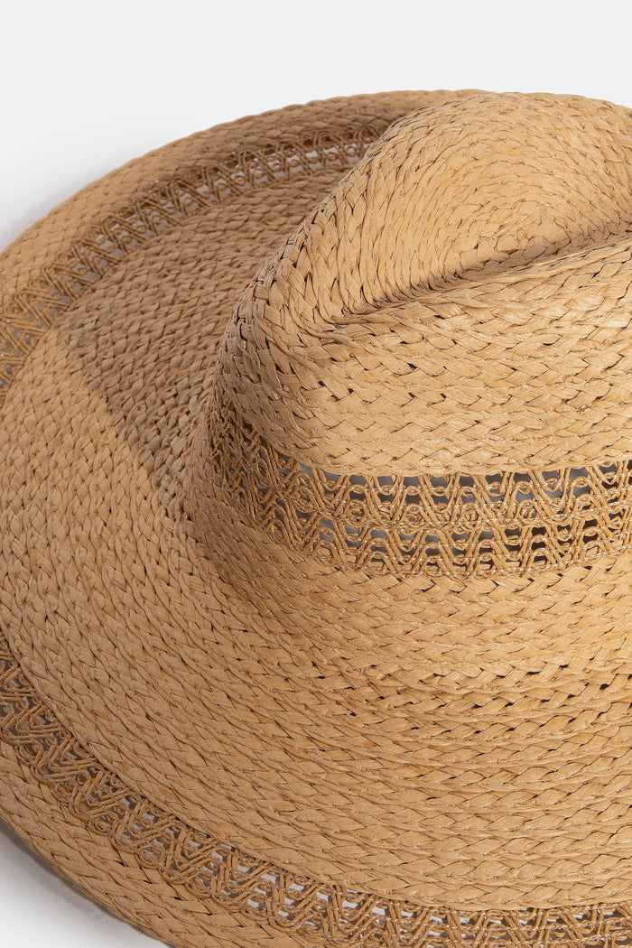 Boho flat brim straw hat by Collections by Fame Accessories, featuring a wide brim and woven straw design for stylish sun protection.