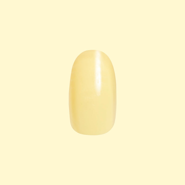 Bright & Focused | Round | Short press-on nail in soft yellow with glossy finish shown on pale yellow background