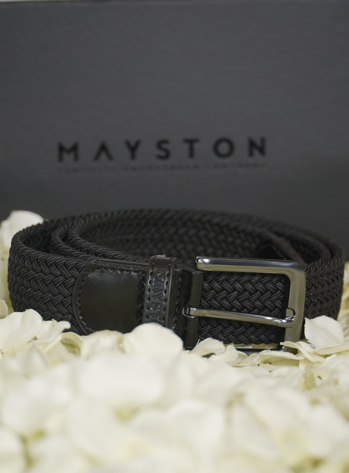 Black Elastic woven belt with silver buckle on a white floral background with Mayston branding.