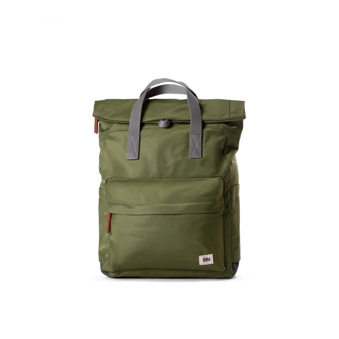 Olive green medium nylon backpack with gray top handles, front panel pocket, and zips