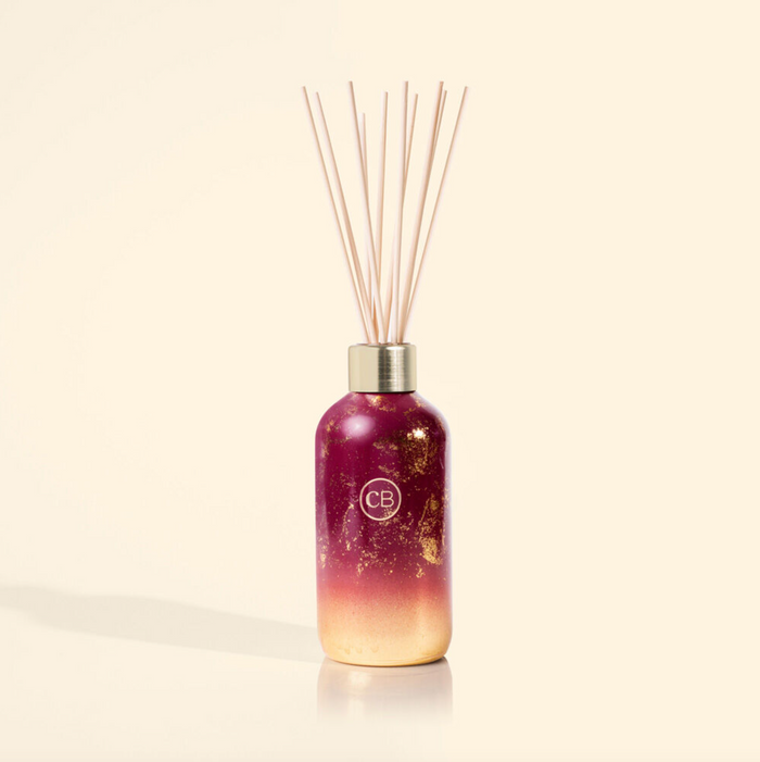 Capri Blue 8 oz Glim Reed Diffuser Scents in Tinsel & Spice at Wrapsody
