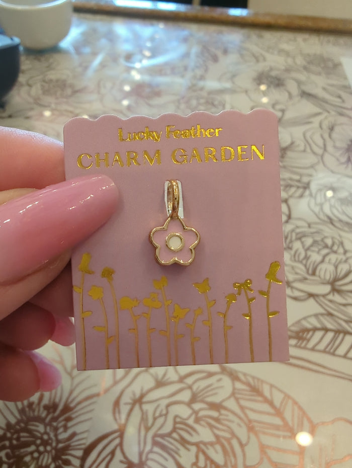 Lucky Feather Charm Garden Flower Gold charm featuring detailed gold flower design, ideal for jewelry or charm collection.