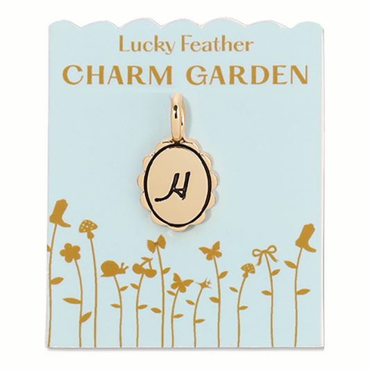 Gold Lucky Feather Charm Garden scalloped initial H charm showing intricate scalloped edges and a gold finish.