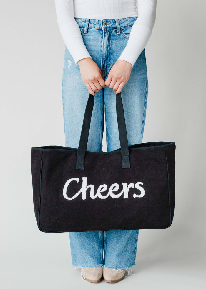 Panache Apparel Co. Cheers Tote bag with sturdy handles and cheerful design, perfect for casual outings and everyday use.