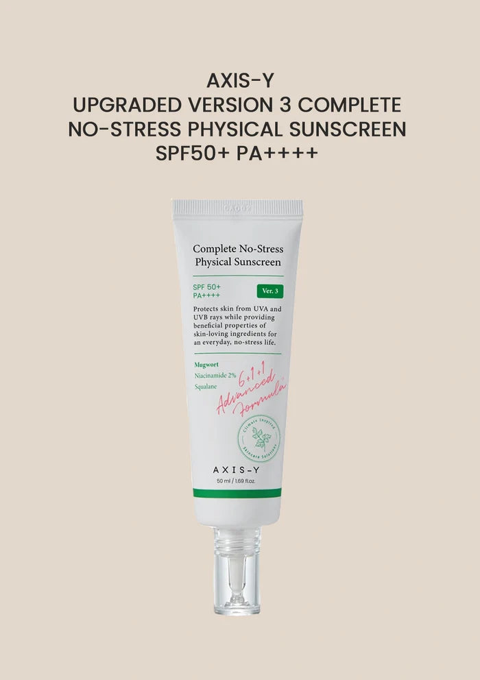 Tube of Axis-Y sunscreen on a beige background