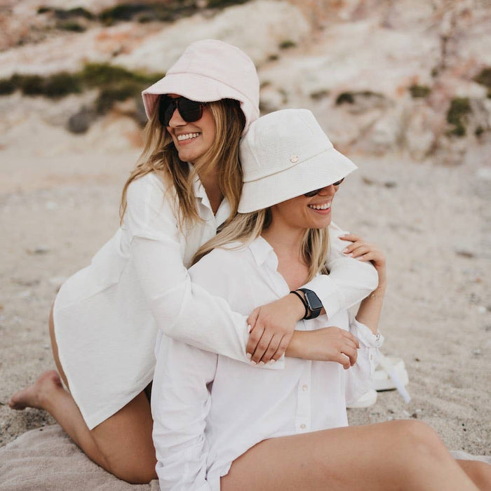 Pretty Simple Clearwater bucket hat in beige, with a wide brim and casual style, perfect for sun protection and outdoor wear.