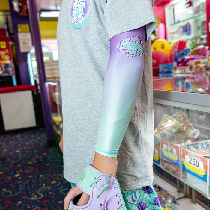 Youth model wearing Cotton Candy Galaxy Grape youth arm sleeve