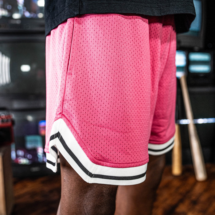 Adult model wearing red Court Azalea shorts