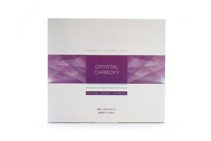 The CRYSTAL CARBOXY MASK packaging showcasing the non-invasive carboxytherapy technology. This image features an elegantly designed box for the imported face mask, highlighting the benefits of the Stayve Korean Masks and Tok Tok Mask.