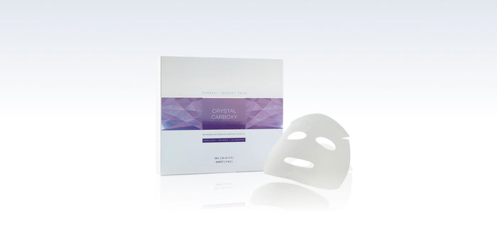 The CRYSTAL CARBOXY MASK box alongside an applied mask on a model. This photo illustrates the effectiveness of the imported face mask found in the Stayve Korean Masks and Tok Tok Mask range.