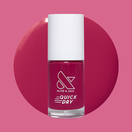 Olive and June Darling quick dry gel polish bottle shown with deep hot magenta swatch on pink background