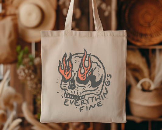 Eleven Fashion skeleton tote bag featuring "Everything Is Fine" text, black fabric with white skeleton graphic, casual bag for everyday use.