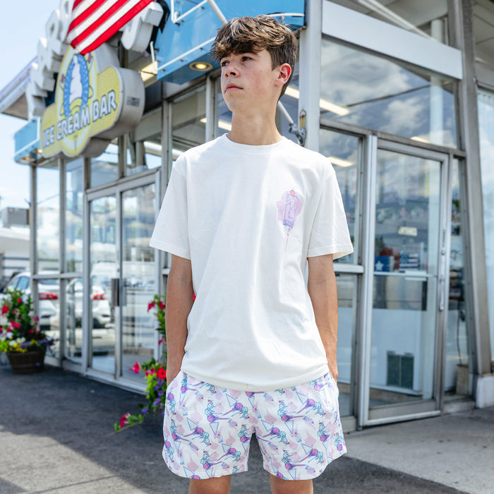 Adult model wearing shorts with "Fastball Scoops" design