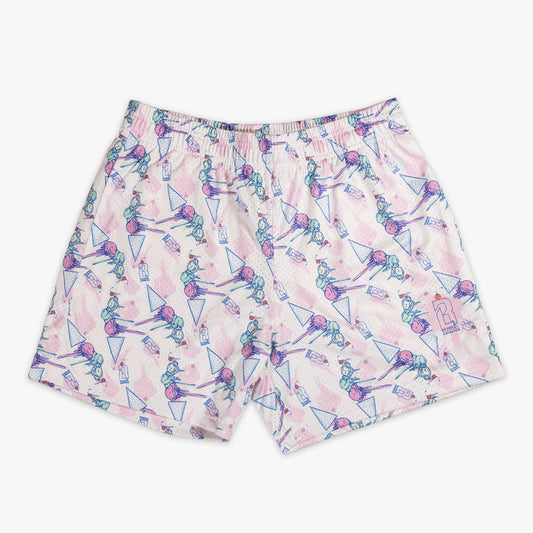 Youth model wearing youth shorts with "Fastball Scoops" design