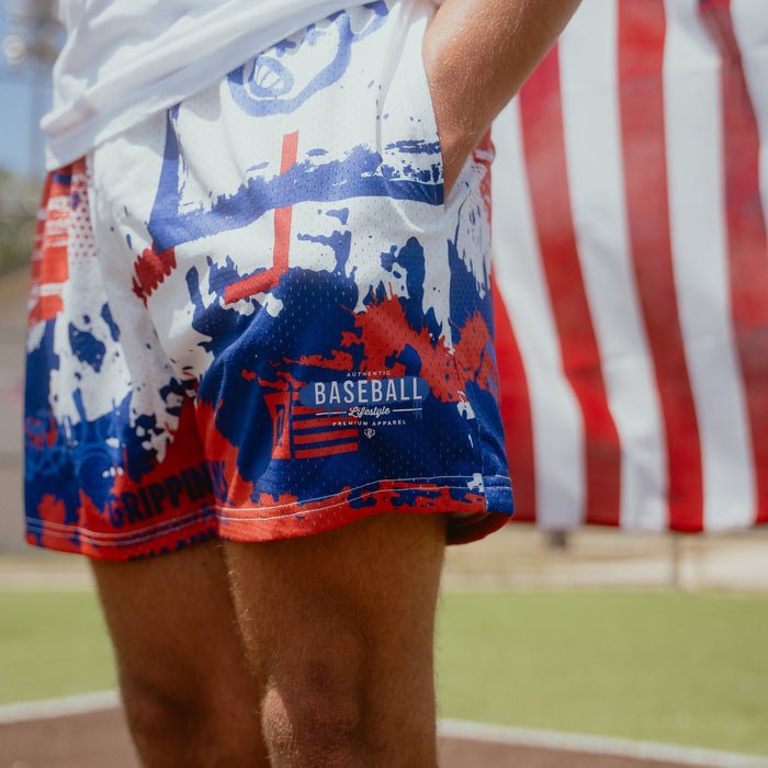 Adult model wearing multi-color Graffiti USA shorts