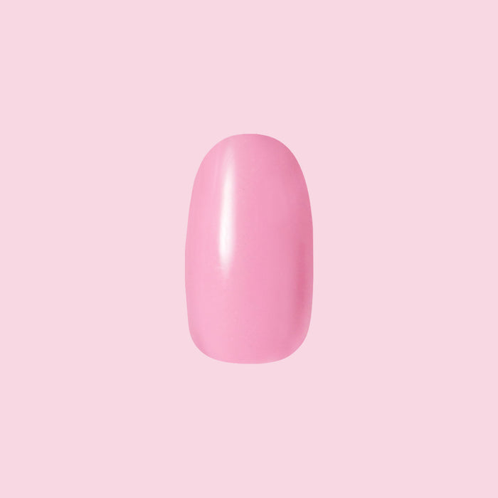 Single pink press-on nail in a short round shape from Grateful & Kind | Round | Short for easy at-home mani