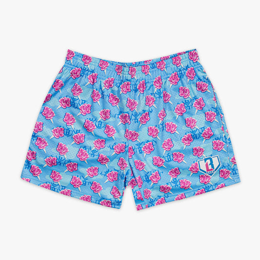 Blue shorts with pink cotton candy pattern on a white background