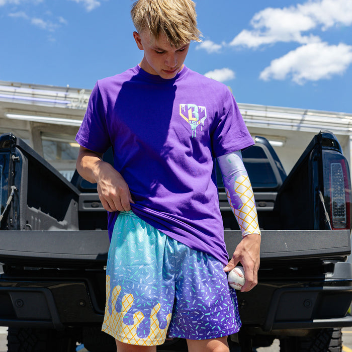 Adult model wearing ice Cream Galaxy Grape shorts