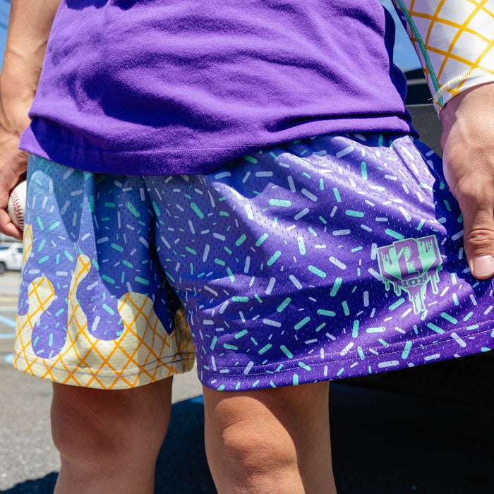 Adult model wearing ice Cream Galaxy Grape shorts