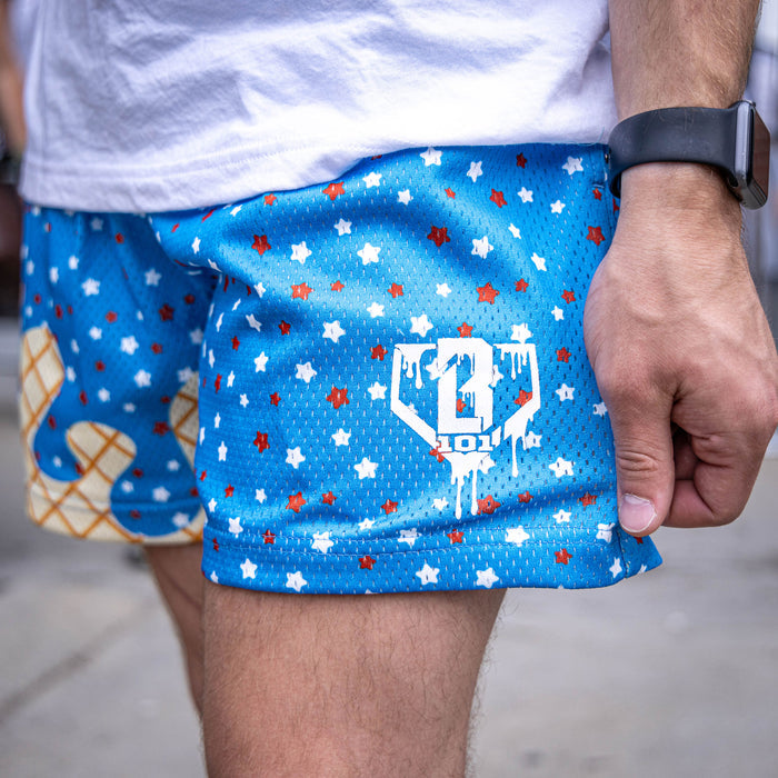 Adult model wearing blue Ice Cream USA shorts