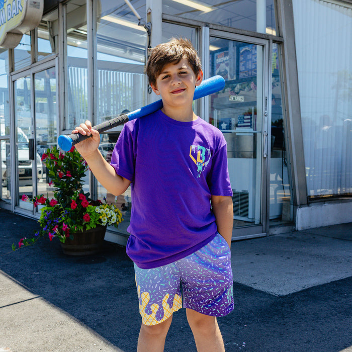 Youth model wearing ice Cream Galaxy Grape youth shorts