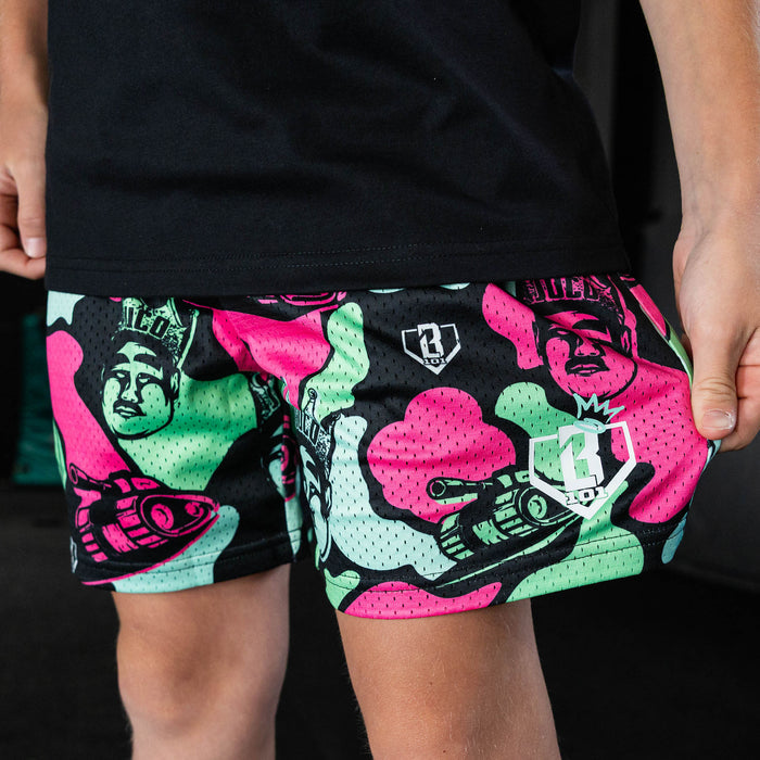 Youth model wearing black shorts with "King Of JUCO" design