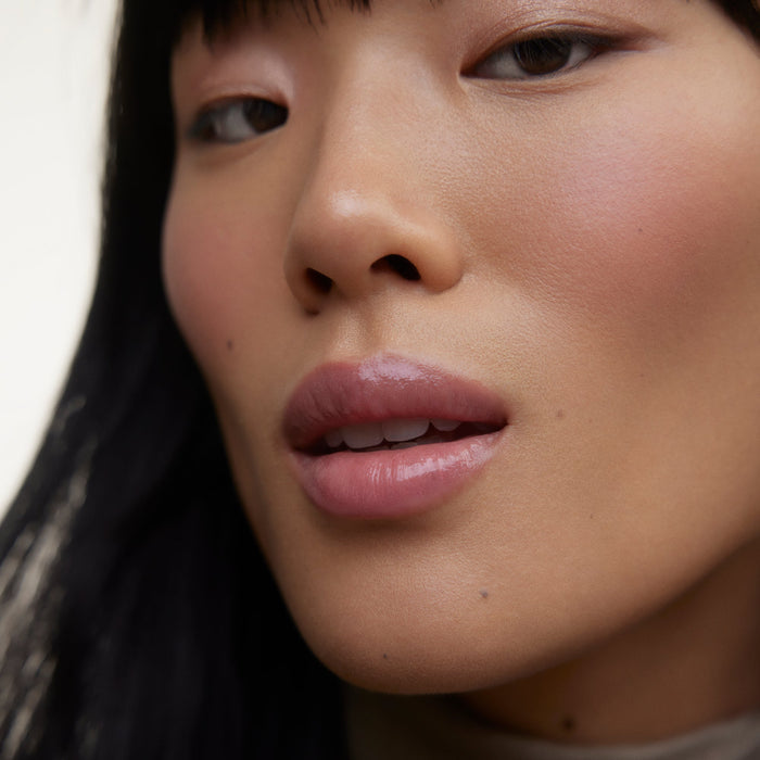 Wonderblush-La Laque Tinted Lip Oil-Makeup-LaLaque-ModelMediumSkin-Flamant_jpg-The Detox Market | Flamant - Soft baby pink
