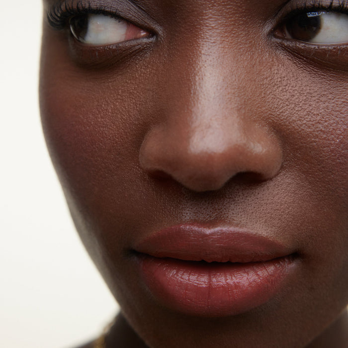 Wonderblush-Le Rouge Lipstick-Makeup-LeRouge-ModelDarkSkin-Cassis-The Detox Market | Cassis - Muted wine