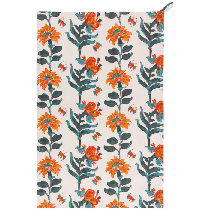 Tea towel with marigolds printed all over it.