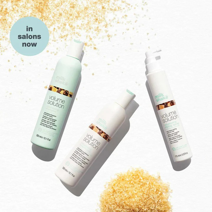 Milk_Shake Volumizing Shampoo bottles flatlay