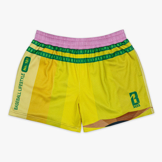 Yellow youth shorts with “Pencil” design — front view