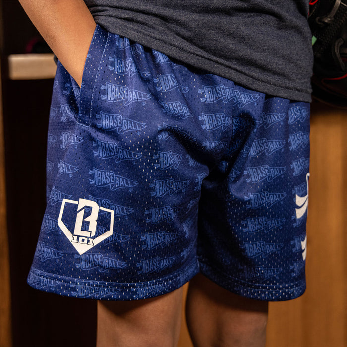 Youth model wearing red Pennant USA youth shorts