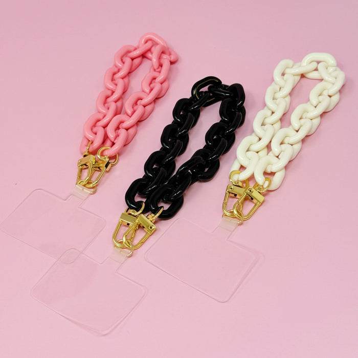 Ellison+Young phone wrist lanyard with chain and strap, designed for secure holding and stylish accessory for smartphones