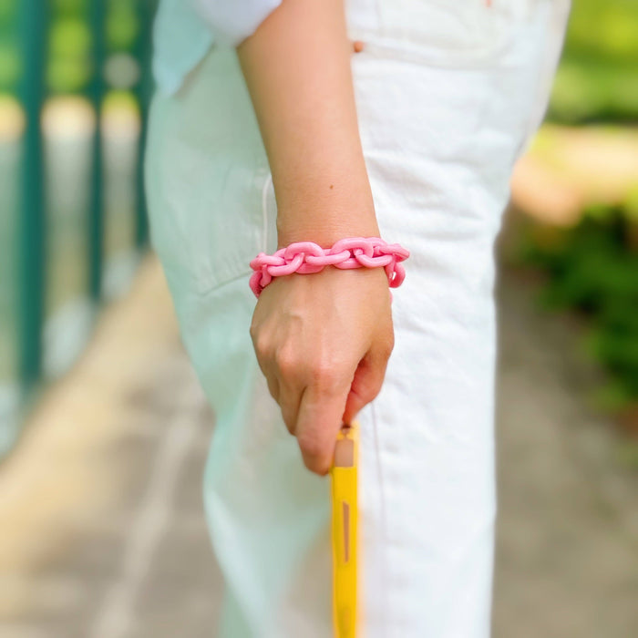 Ellison+Young phone wrist lanyard with adjustable strap and clip, designed for secure attachment to smartphones.