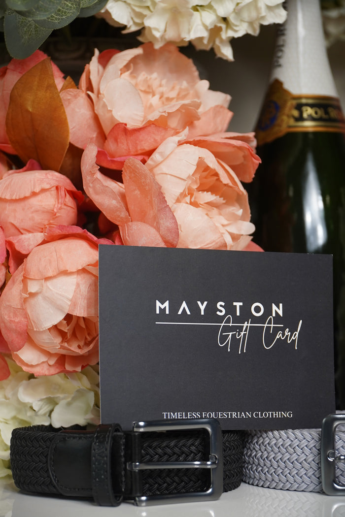 Mayston belt with a box and flowers in the background