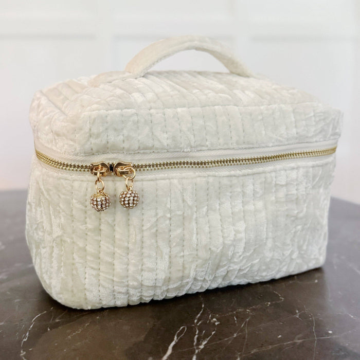 Ellison+Young quilted velvet vanity case with a compact, stylish design and zipper closure for travel and organization.