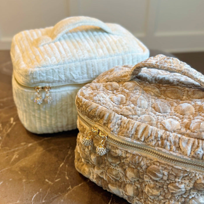 Ellison+Young quilted velvet vanity case with a compact, elegant design featuring a soft, textured velvet surface and zipper closure.