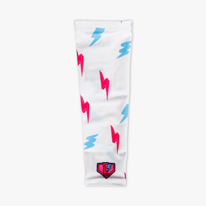 Youth model wearing white and pink and blue Rain Delay Lightning Arm Sleeve youth sleeve