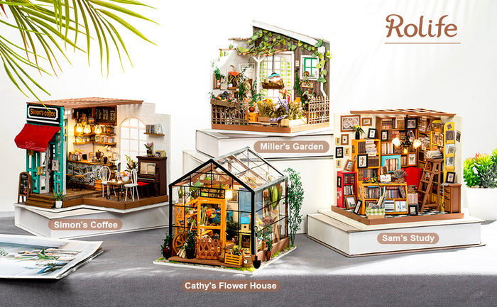 Collection of Rolife mini model houses with detailed interiors on a white background.